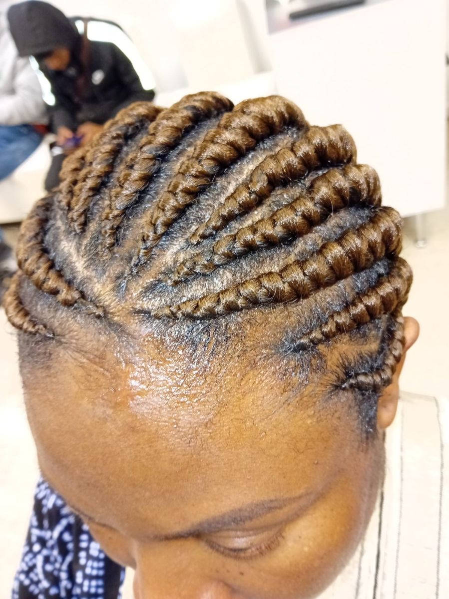 Tissage afro à la racine à Lyon 7 par UCM Coiffure Mixte